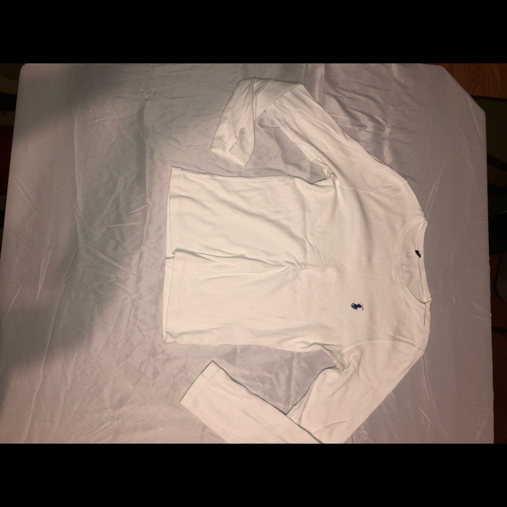 white polo with navy blue logo